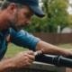 Plumber inspecting pipe for relining service near me