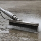 High-pressure water jet cleaning concrete